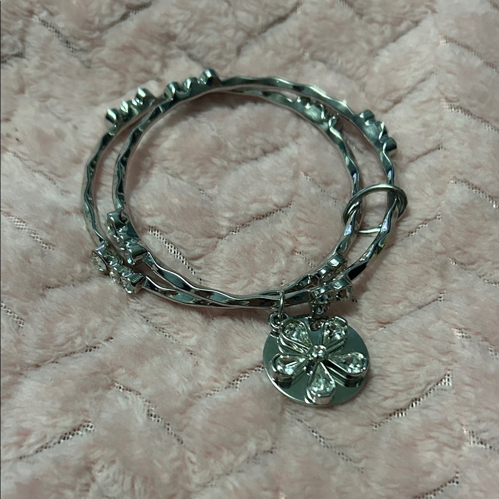 Double bracelet with flower charm
